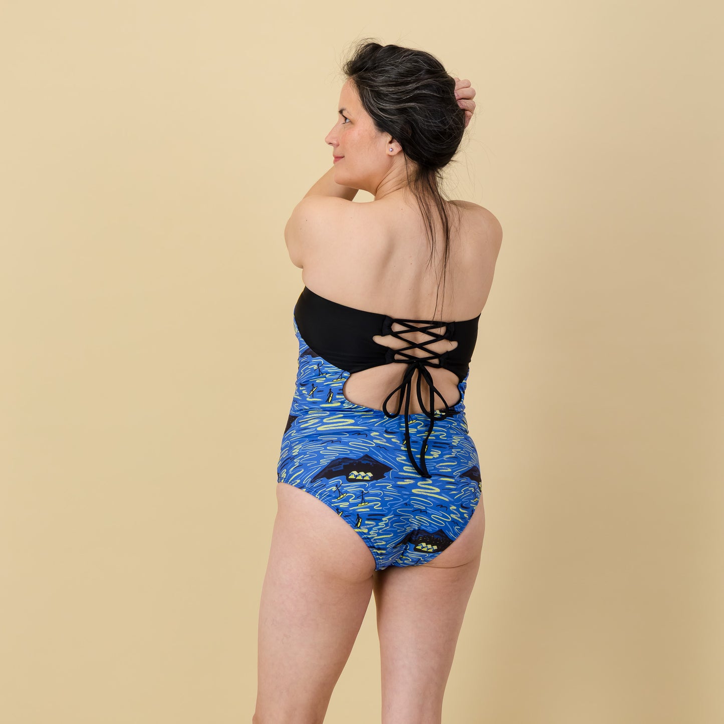 Adjustable lace-up back detail for custom support – Marina Full Costume strapless swimsuit